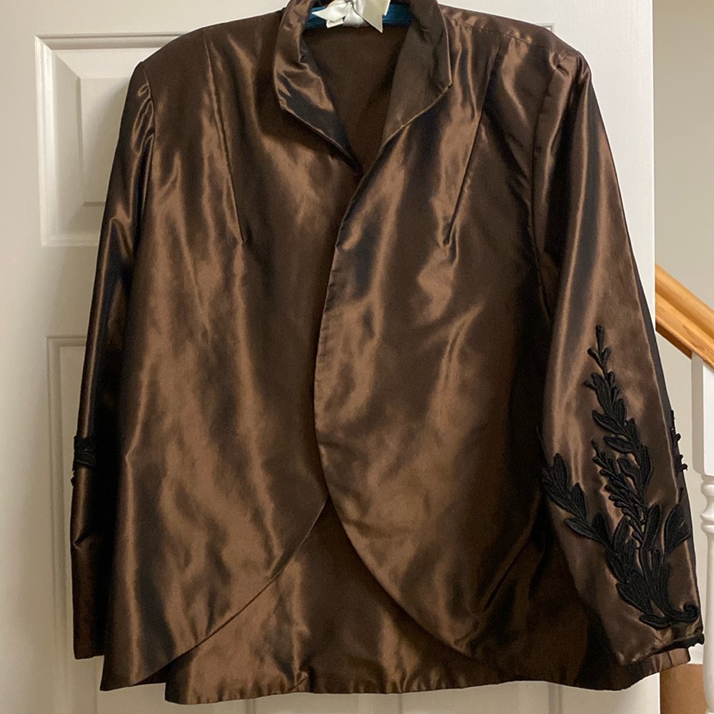 Custom made silk blazer with embroidery on both sleeves.